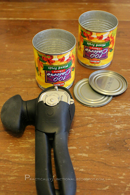 Opened tin cans with can opener