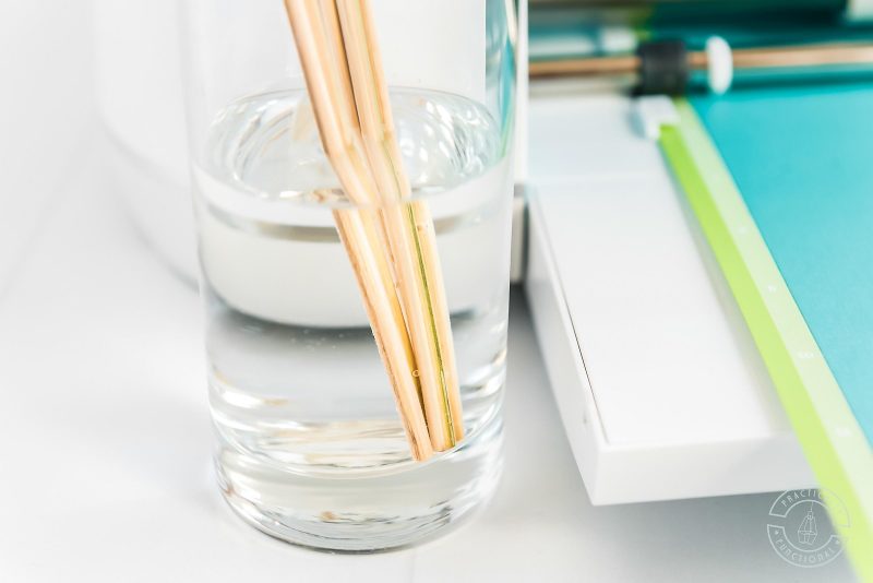 Soften bamboo skewers with water to use as base for paper pinwheels