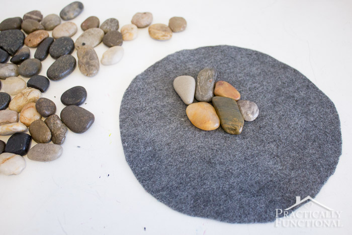 river rocks glued onto center of a piece of felt to make a river rock trivet