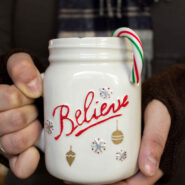 Make a cute DIY painted mug for the holidays with paint pens and adhesive stencils! Great neighbor gifts!