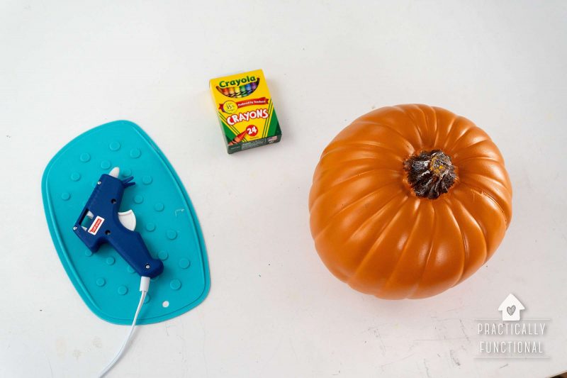 Supplies needed to make a melted crayon pumpkin