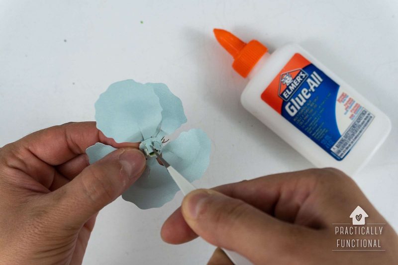 Assemble diy paper flowers with glue