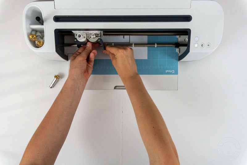 Switch between perforation blade and fine point blade to cut and perforate the same sheet of paper without unloading