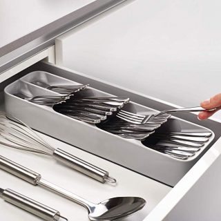How to organize a kitchen silverware drawer with an organizer