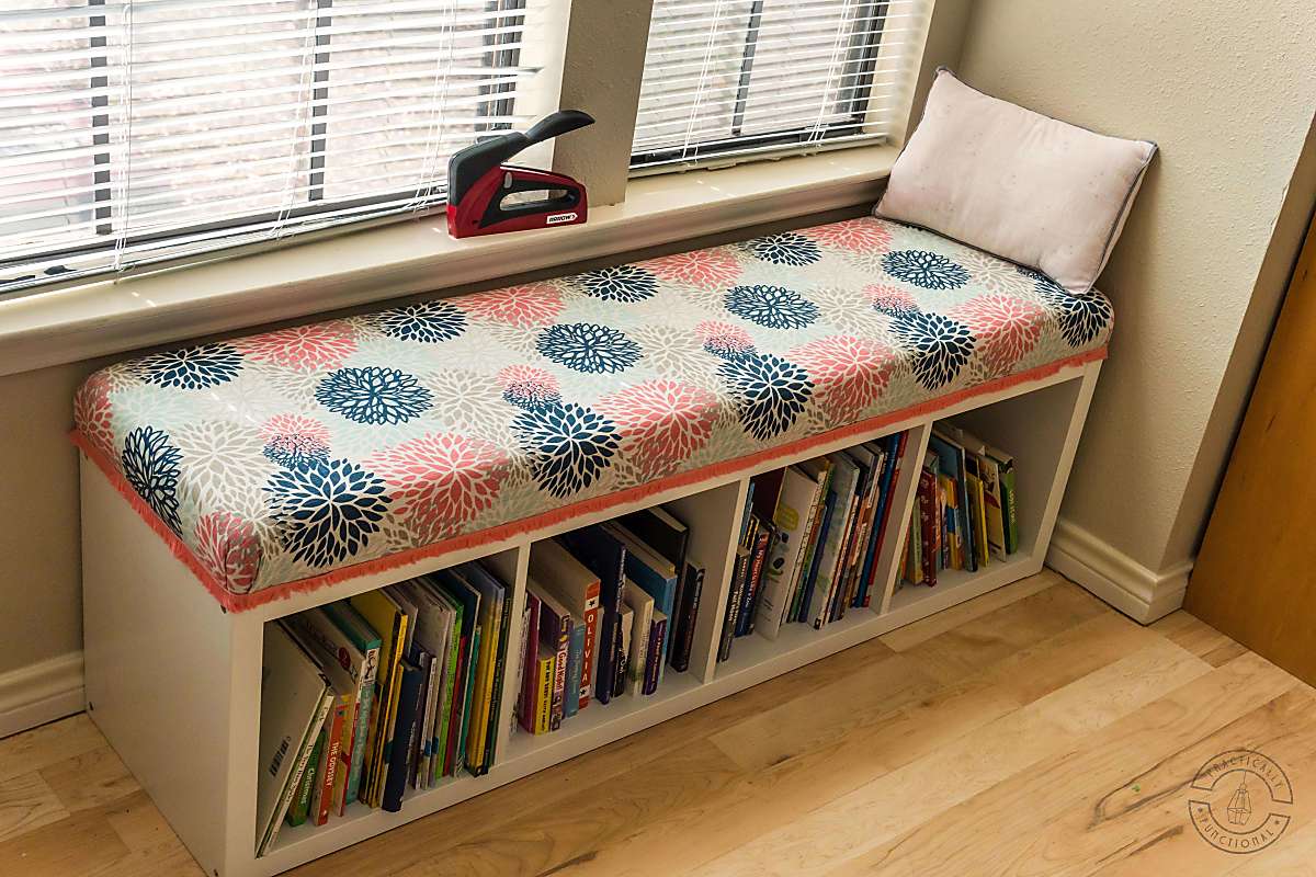 diy bench seat cushion on top of ikea kallax cubby storage unit to turn it into a window seat and book storage